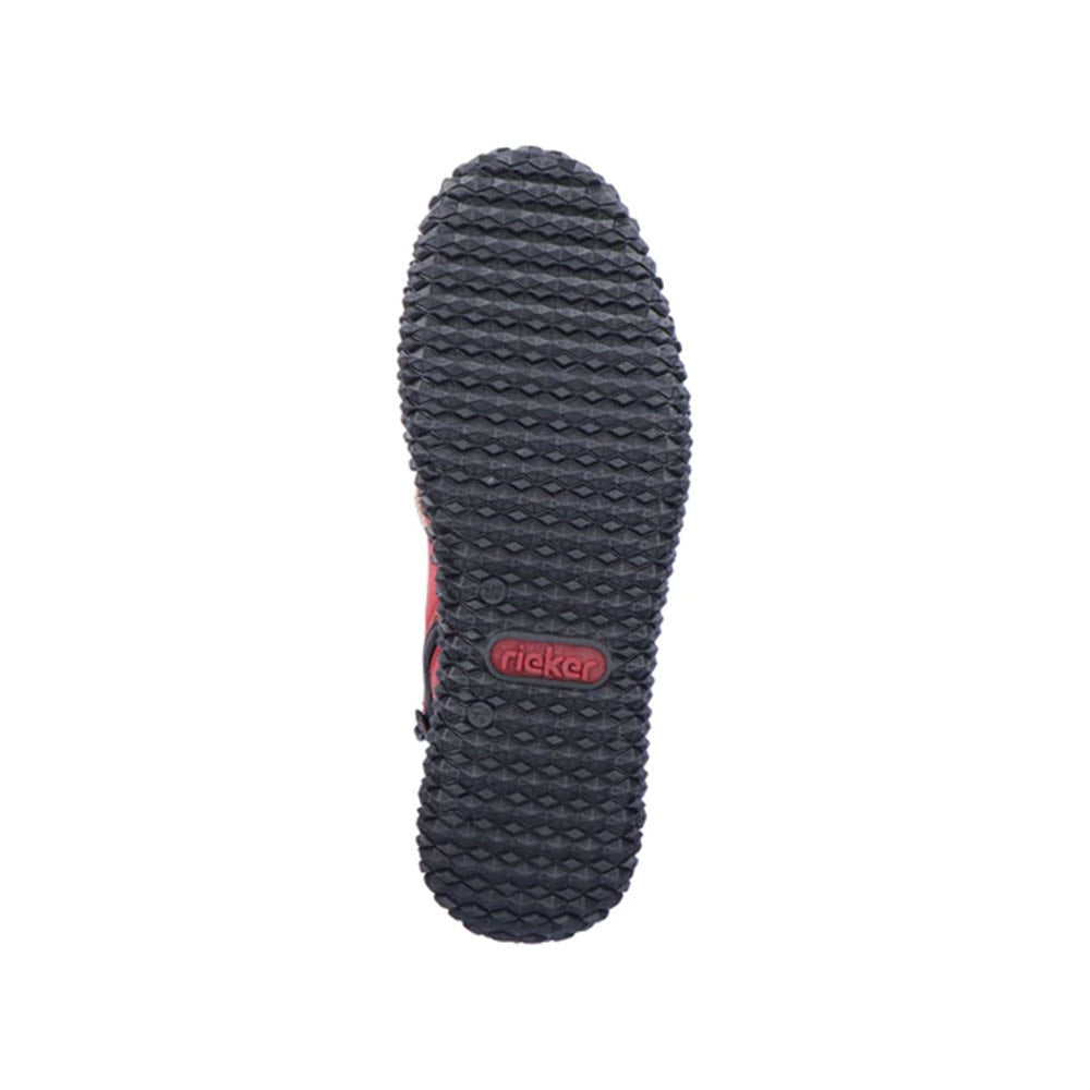 Bottom view of a black ankle boot sole with a textured pattern and a visible Rieker logo.
