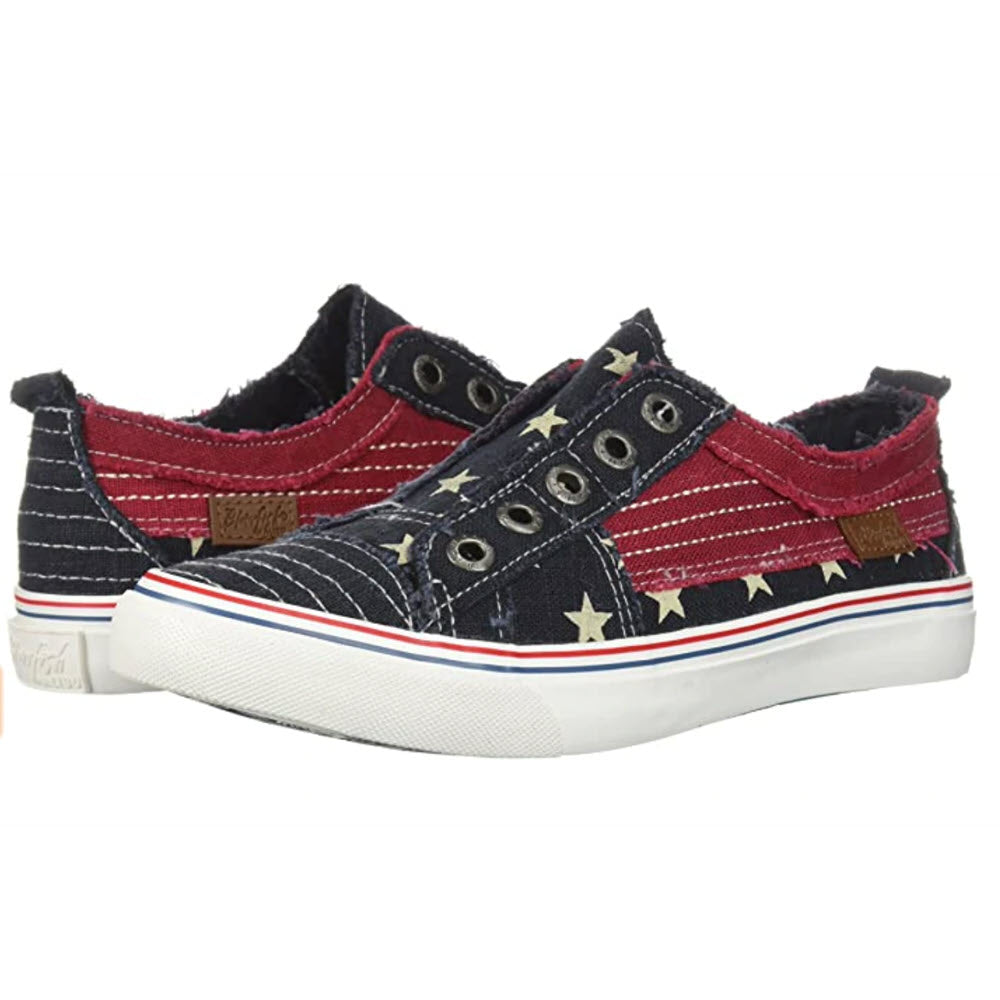 Pair of blue canvas Blowfish Malibu Play sneakers with red stripes and star patterns, featuring slip-on design with eyelets and a white sole.
