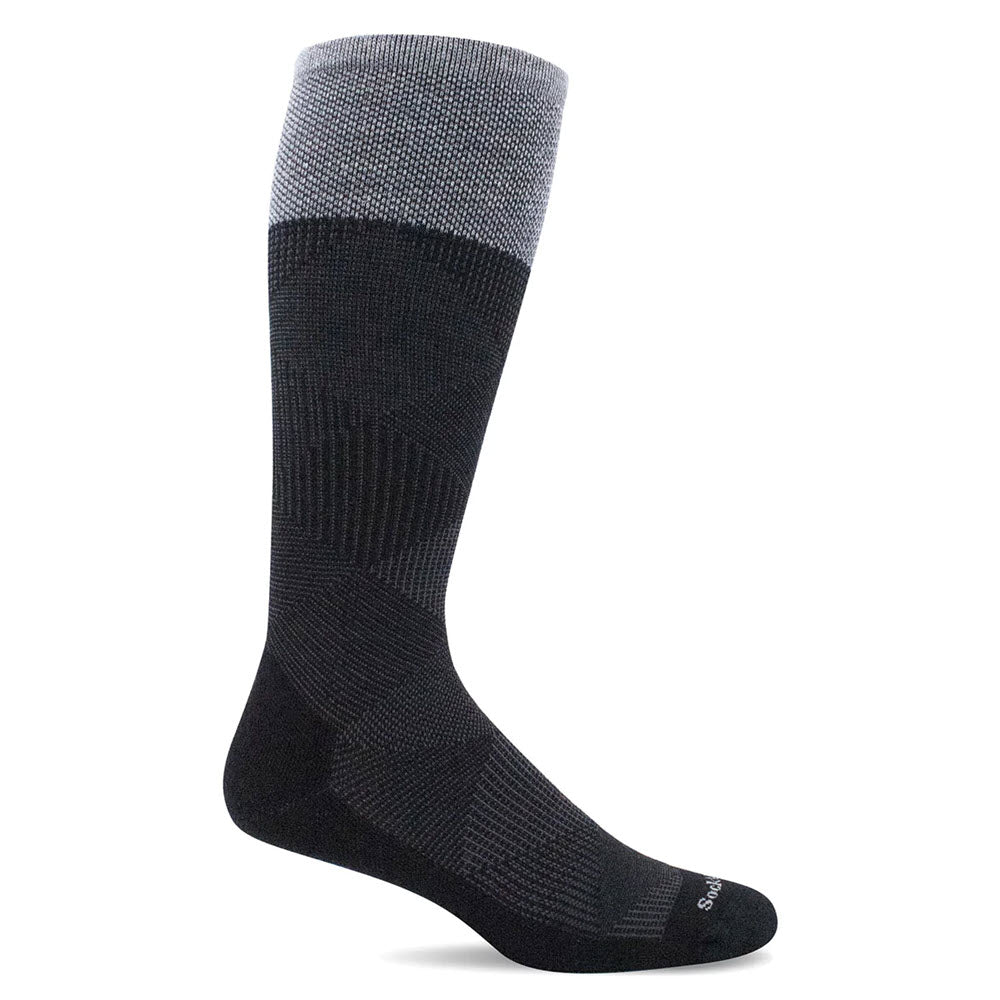 A single SOCKWELL DIAMOND DANDY 15-20 MMHG KNEE HI COMPRESSION SOCK in black and gray displayed against a white background, designed for the right foot with an ankle-high length and a cushioned sole.