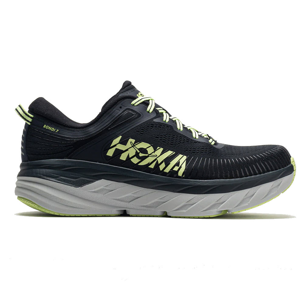 Black and grey cushioned road shoe with neon green accents and HOKA branding, designed for smooth transition. Model: HOKA BONDI 7