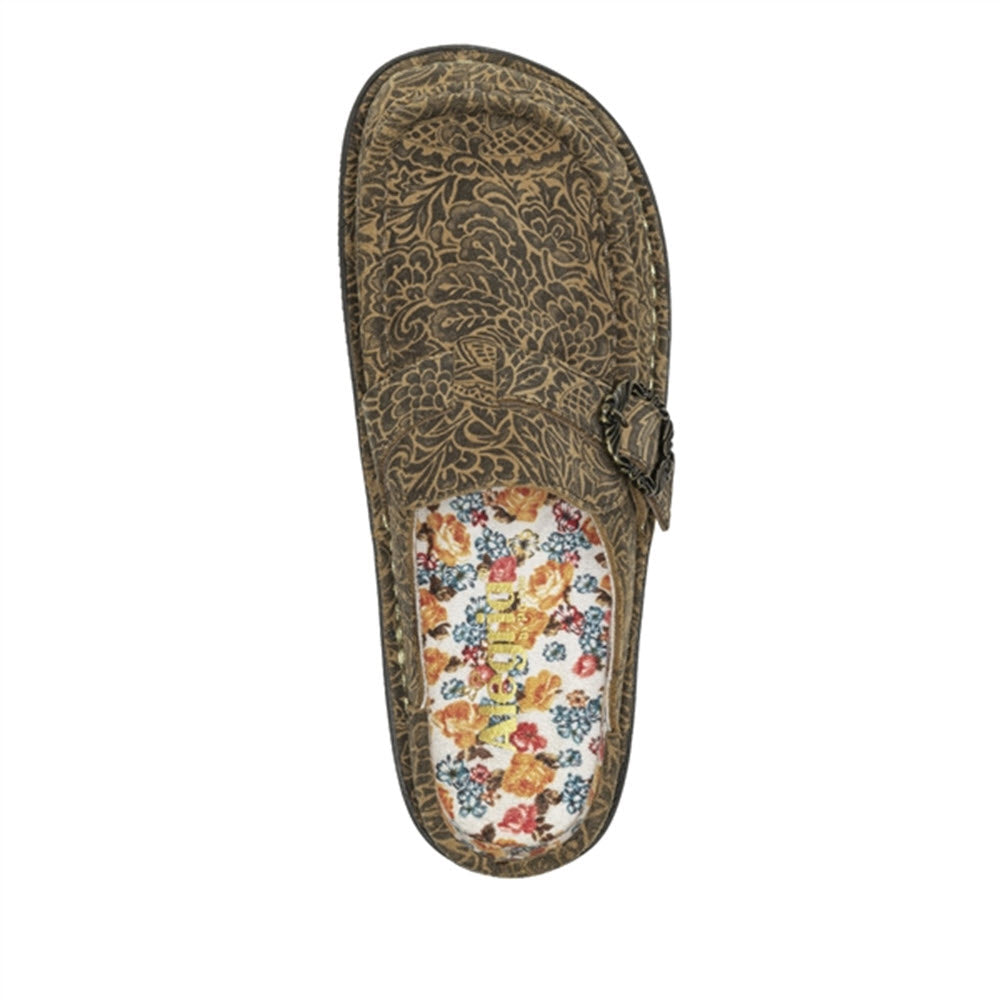 Top view of a Alegria Brigid Freedom Rock slip-on shoe with a floral insole and a small bow on the top.