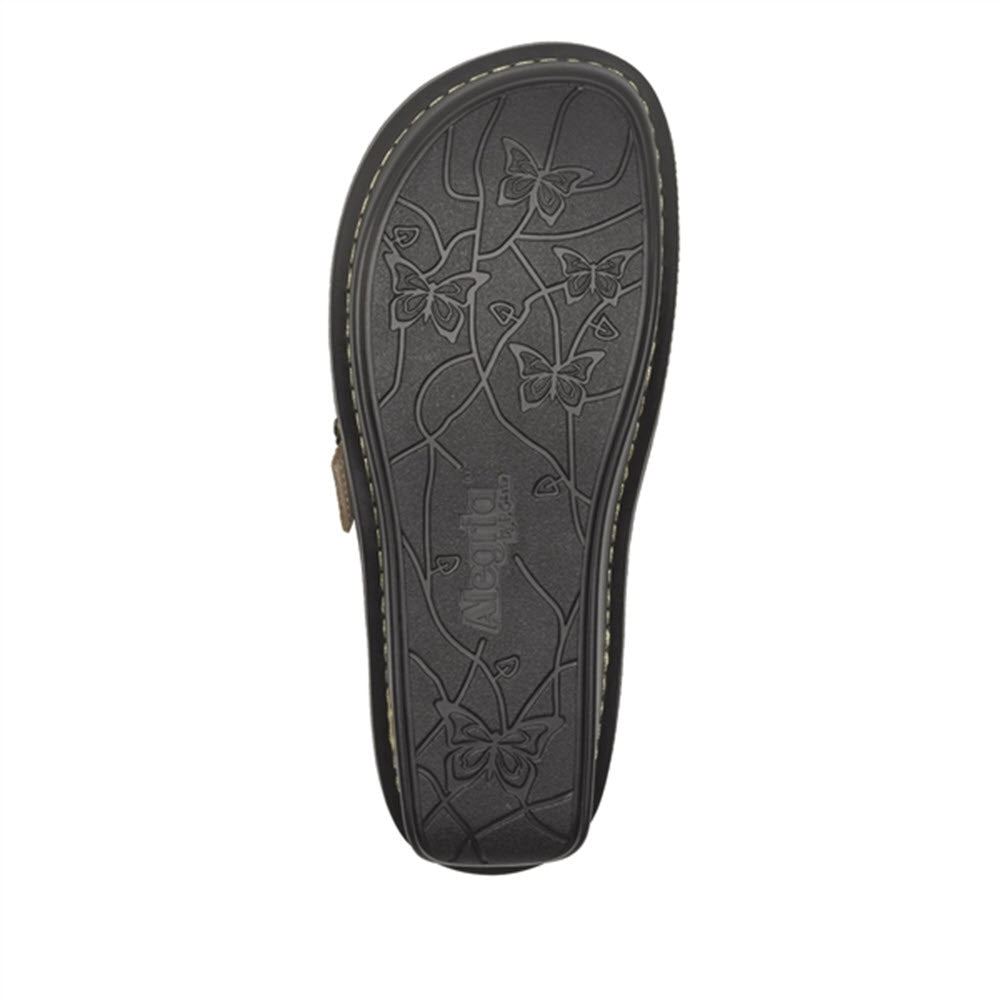 Alegria Brigid Freedom Rock womens shoe sole with a floral pattern and visible brand name, photographed against a white background. It features a slip resistant outsole.