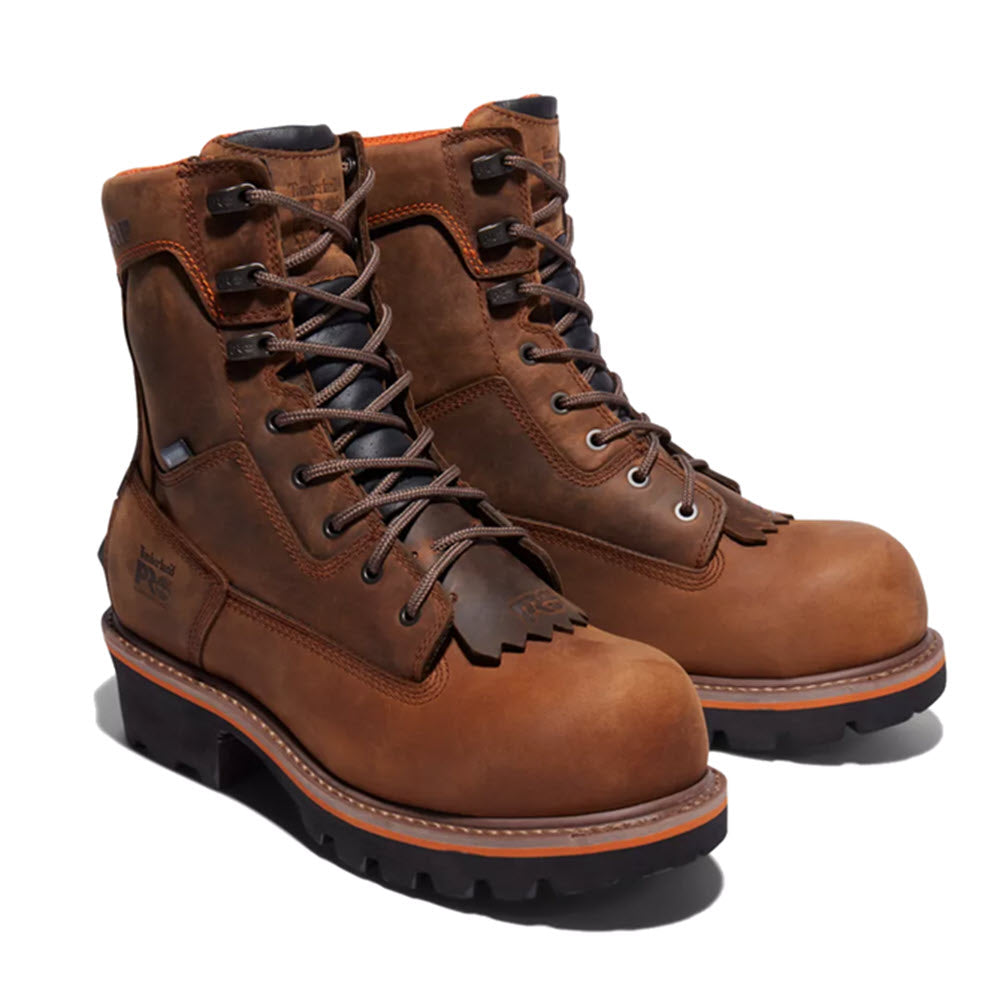 Pair of Timberland Evergreen NT Waterproof Logger Brown work boots with laces on a white background.