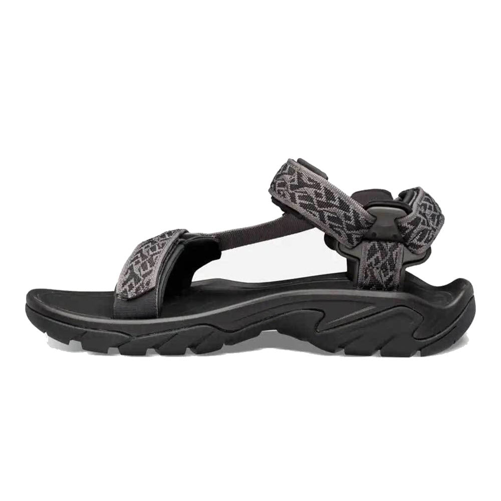 Black Teva Terra Fi 5 Universal sports sandal with adjustable straps on a white background.