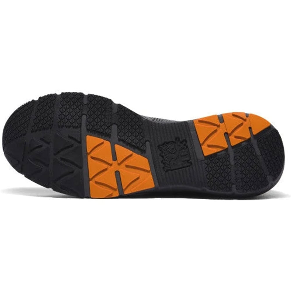 Tread pattern of a black and orange rubber sole of a Timberland shoe with electrical hazard protection.