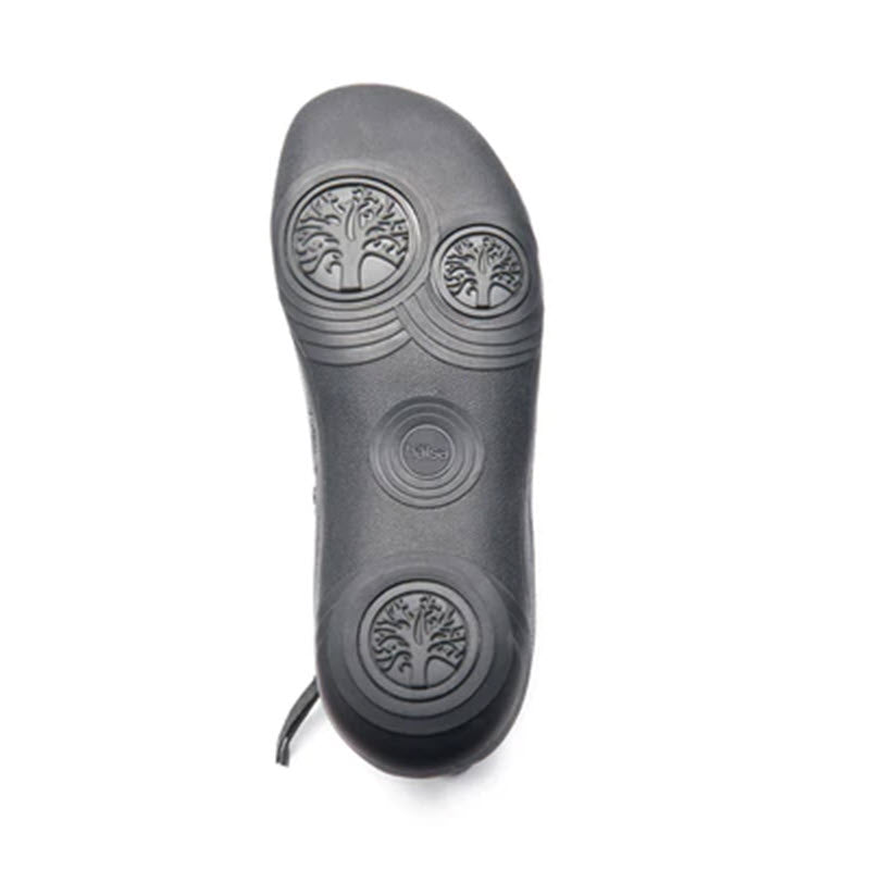 A HALSA ALTHEA BLACK - WOMENS hand-tooled leather insole of a shoe with a circular pattern design displayed against a white background.
