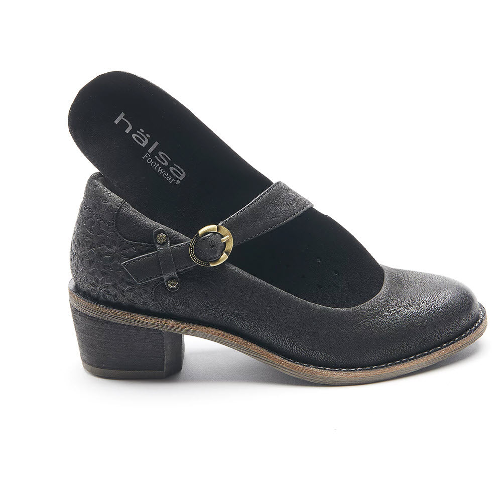 A HALSA MIA BLACK - WOMENS Mary Jane heels with a buckle strap and textured design on a white background.