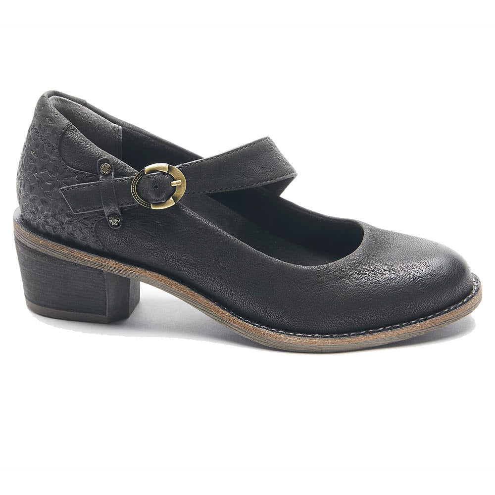 Halsa Mary Jane shoe with a textured design, featuring a strap over the foot and a small, chunky heel.