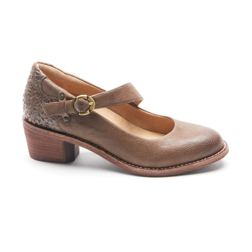 A brown leather HALSA MIA TAUPE - WOMENS Mary Jane shoe with a textured design and a buckled strap, set against a white background.