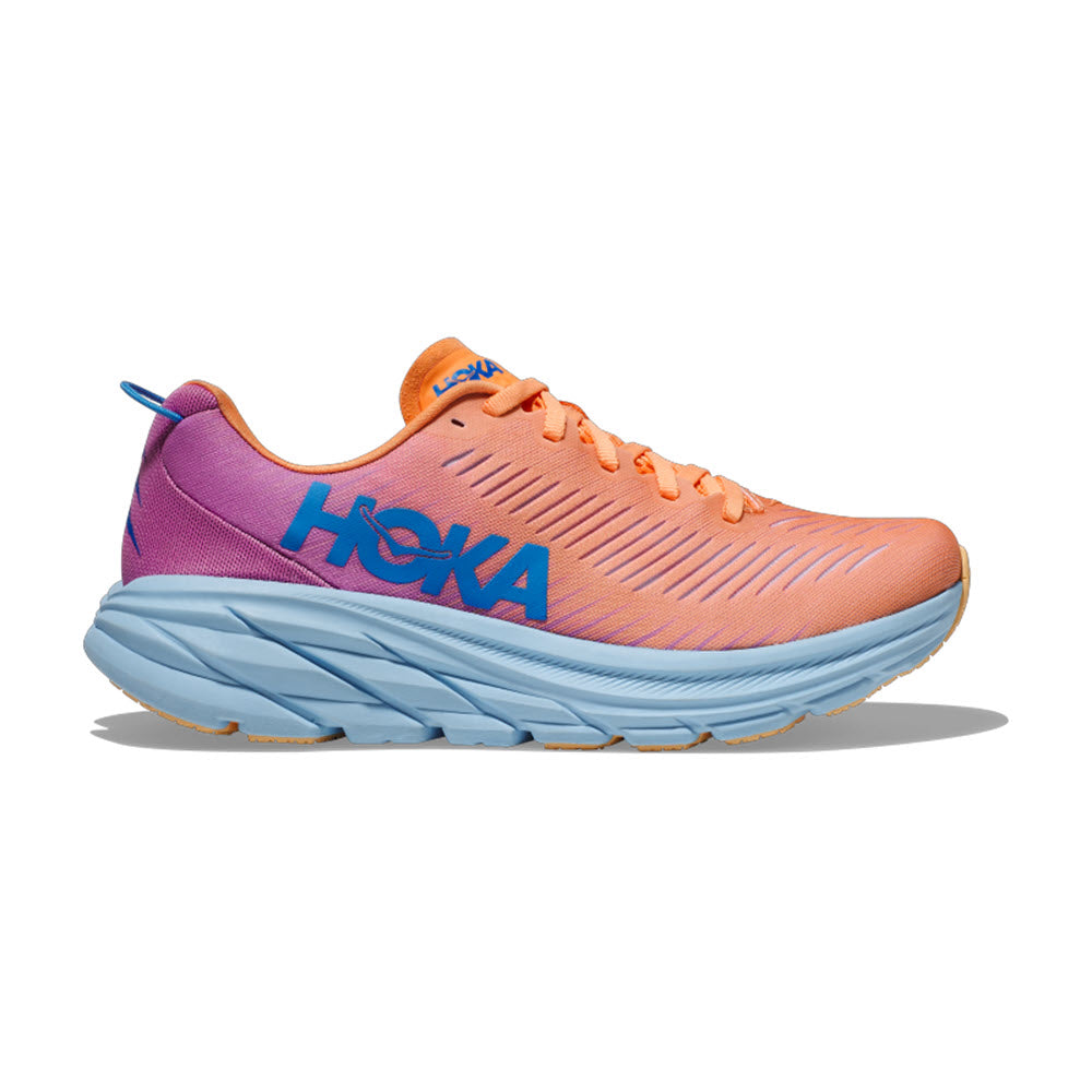 A vibrant Hoka Rincon 3 Mock Orange/Cyclam running shoe with a vented-mesh upper and purple accents, featuring a thick blue sole.