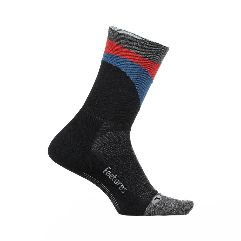 A single Feetures Elite Ultra Light Mini Crew Sock in Retrograde Black with a red and blue striped pattern on the cuff, featuring targeted compression and an ultra light cushioning against a white background.