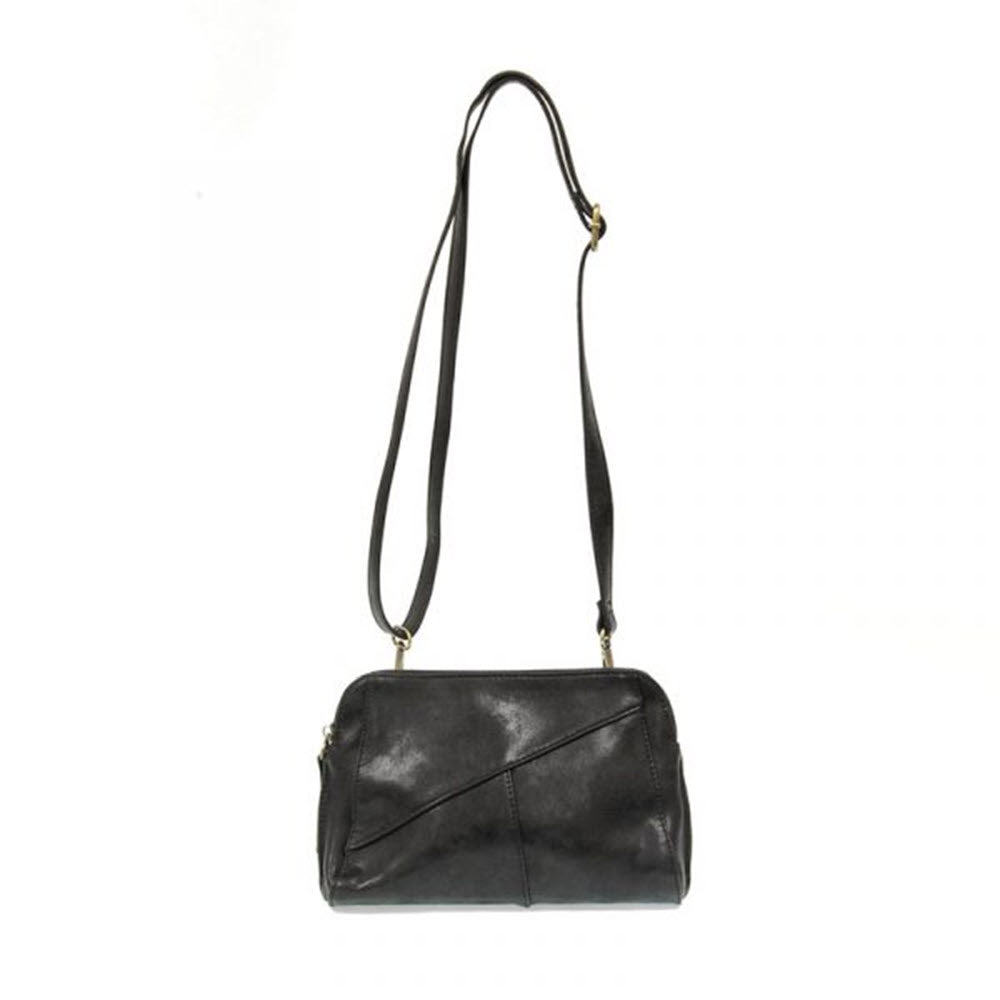 Joy Susan Gigi crossbody bag in black leather with an adjustable strap and a folded flap design, isolated on a white background.