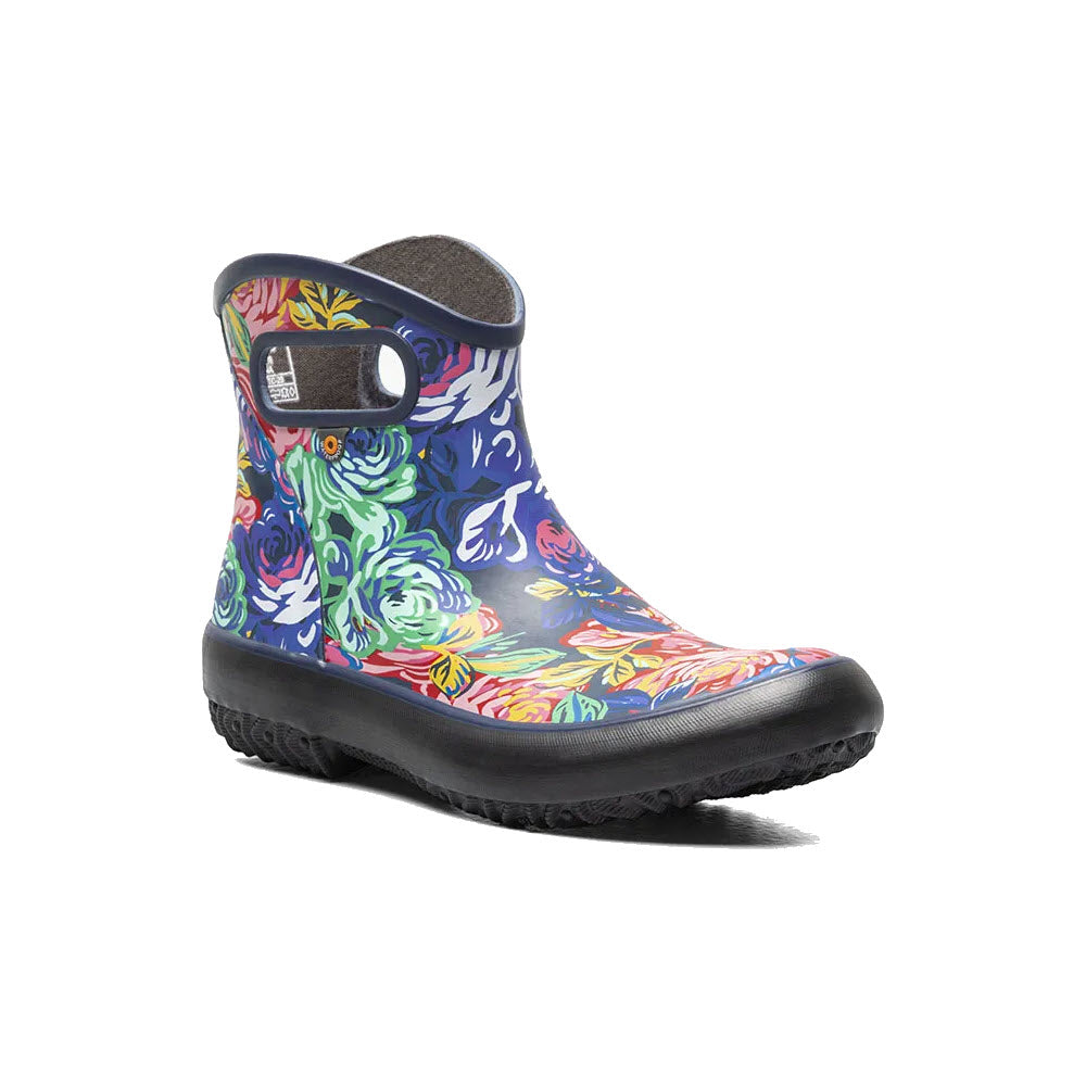 A colorful floral patterned ankle boot with a round toe, black sole, and a BOGS eco-friendly footbed, featuring a loop on the back for easy wearing.