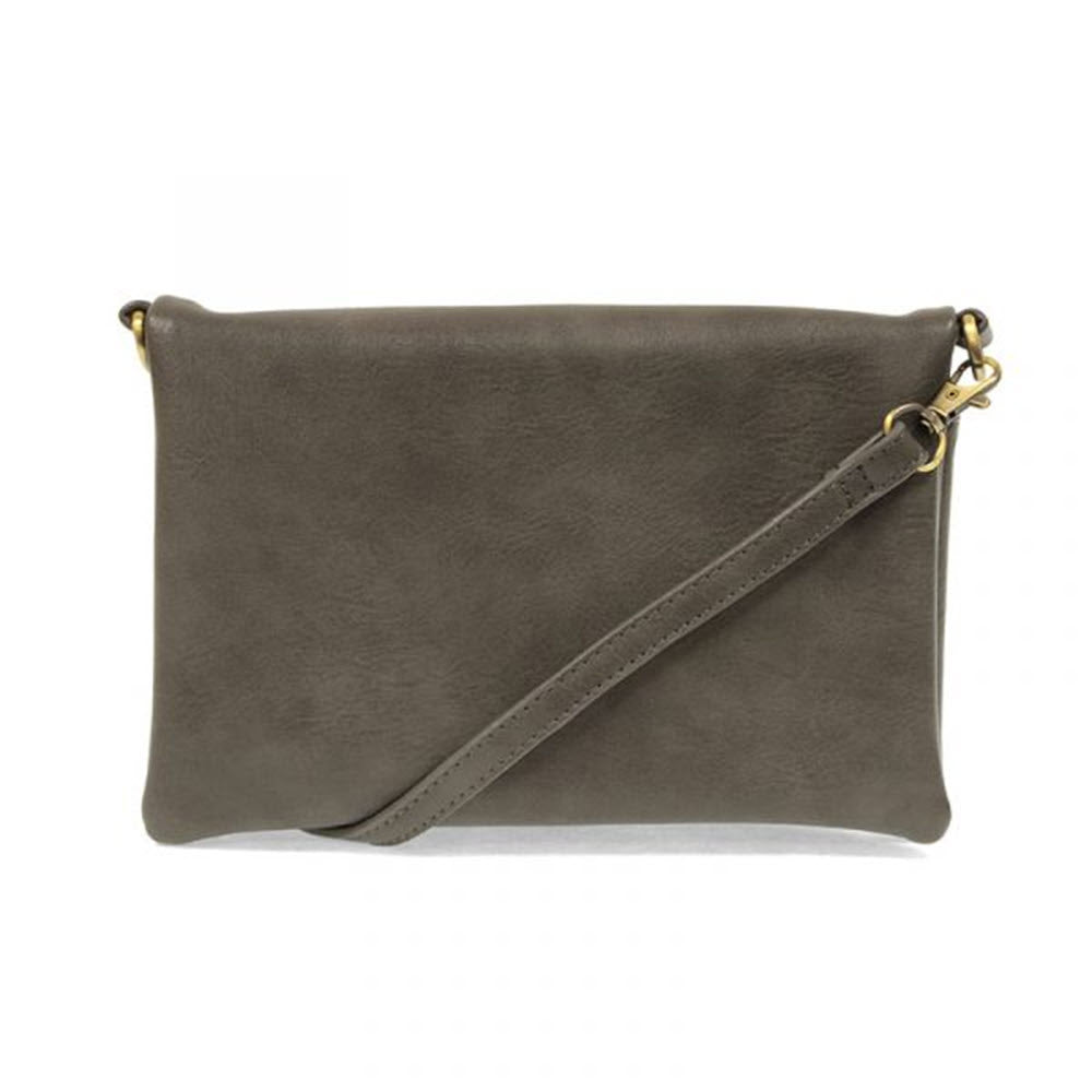 A simple gray JOY SUSAN KITTY SMALL CROSSBODY BAG IRON with a detachable shoulder strap, displayed against a white background.
