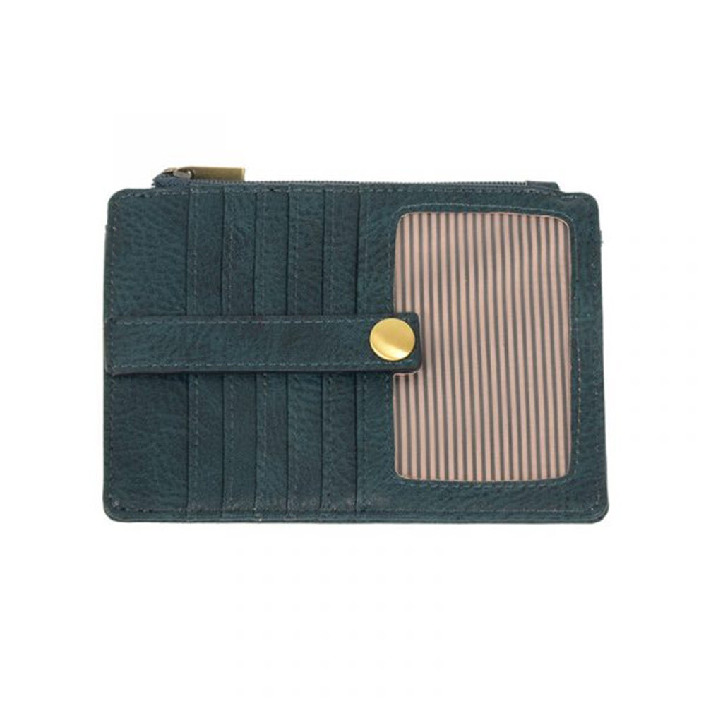 A JOY SUSAN NEW PENNY MINI TRAVEL WALLET DARK TURQUOISE with a striped beige and white panel under a flap closure secured by a gold snap button.
