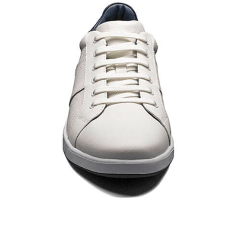 Frontal view of a single Florsheim FLORSHEIM CROSSOVER LACE WHITE - MENS Sneaker with laces on a white background.
