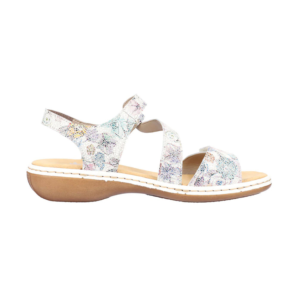 A pair of Rieker women's leather sandals with a floral pattern and two hook-and-loop adjustable straps, featuring a low heel and a white background.