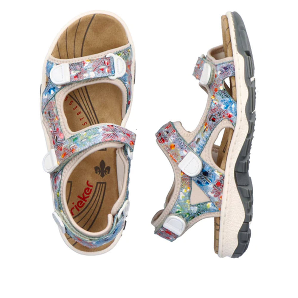 A pair of colorful Rieker children&#39;s sandals with adjustable straps, featuring a multicolor print and a closed-toe design.
