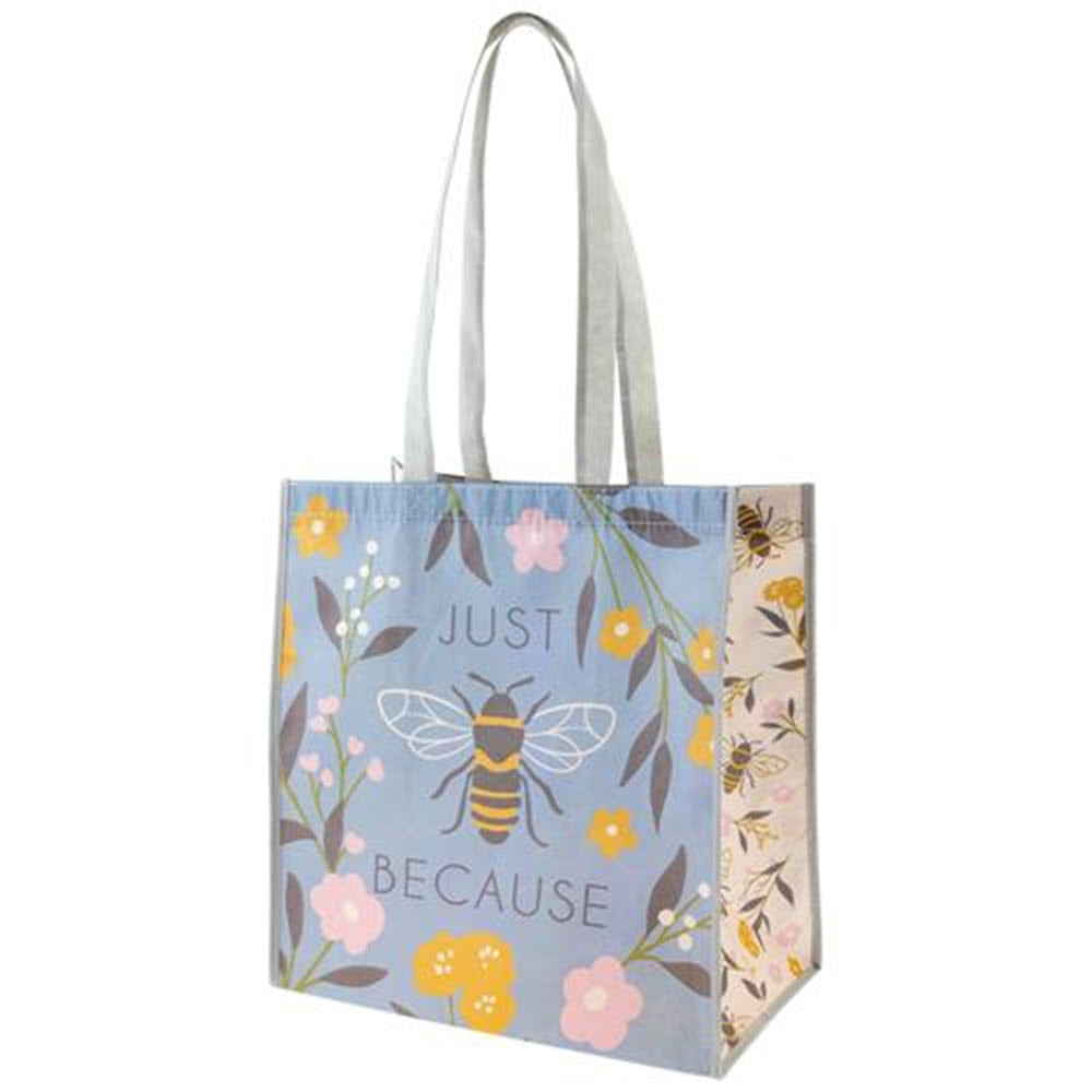 Floral tote bag with a bee design and the phrase "just because," made from recycled materials by Karma.