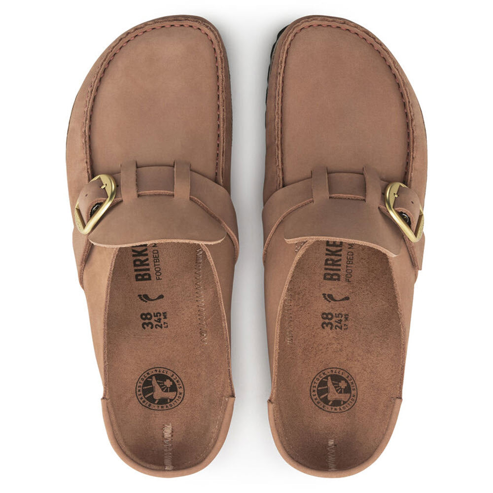 A pair of tan Birkenstock Buckley Old Rose Nubuck sandals viewed from above, featuring adjustable buckles and nubuck leather footbeds.