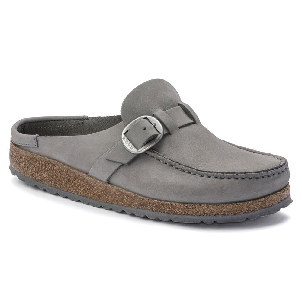 Gray suede Birkenstock Buckley with an adjustable buckle strap and a cork-latex footbed, displayed on a white background.