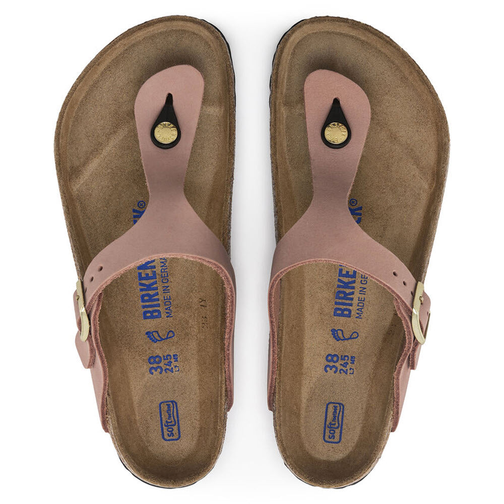 A pair of brown Birkenstock Gizeh thong sandals with buckles, viewed from above.