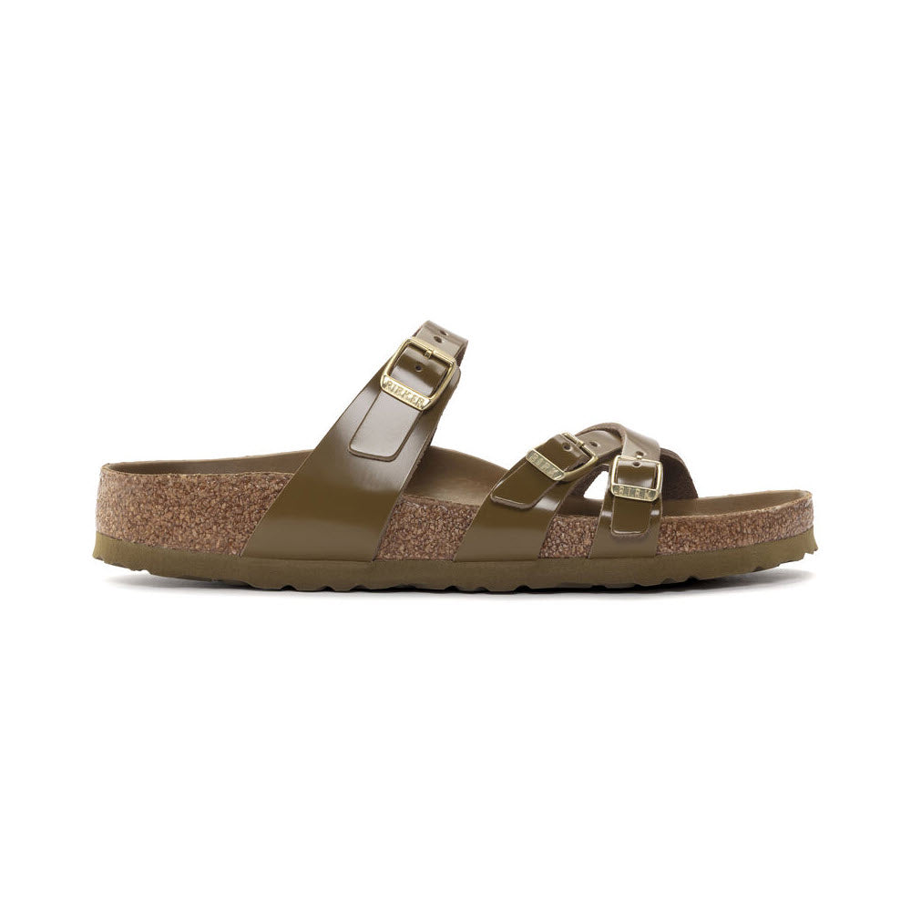 A pair of Birkenstock Franca Hex High Shine Mud Green sandals, featuring double straps with adjustable golden buckles and a cork-latex footbed, set against a white background.