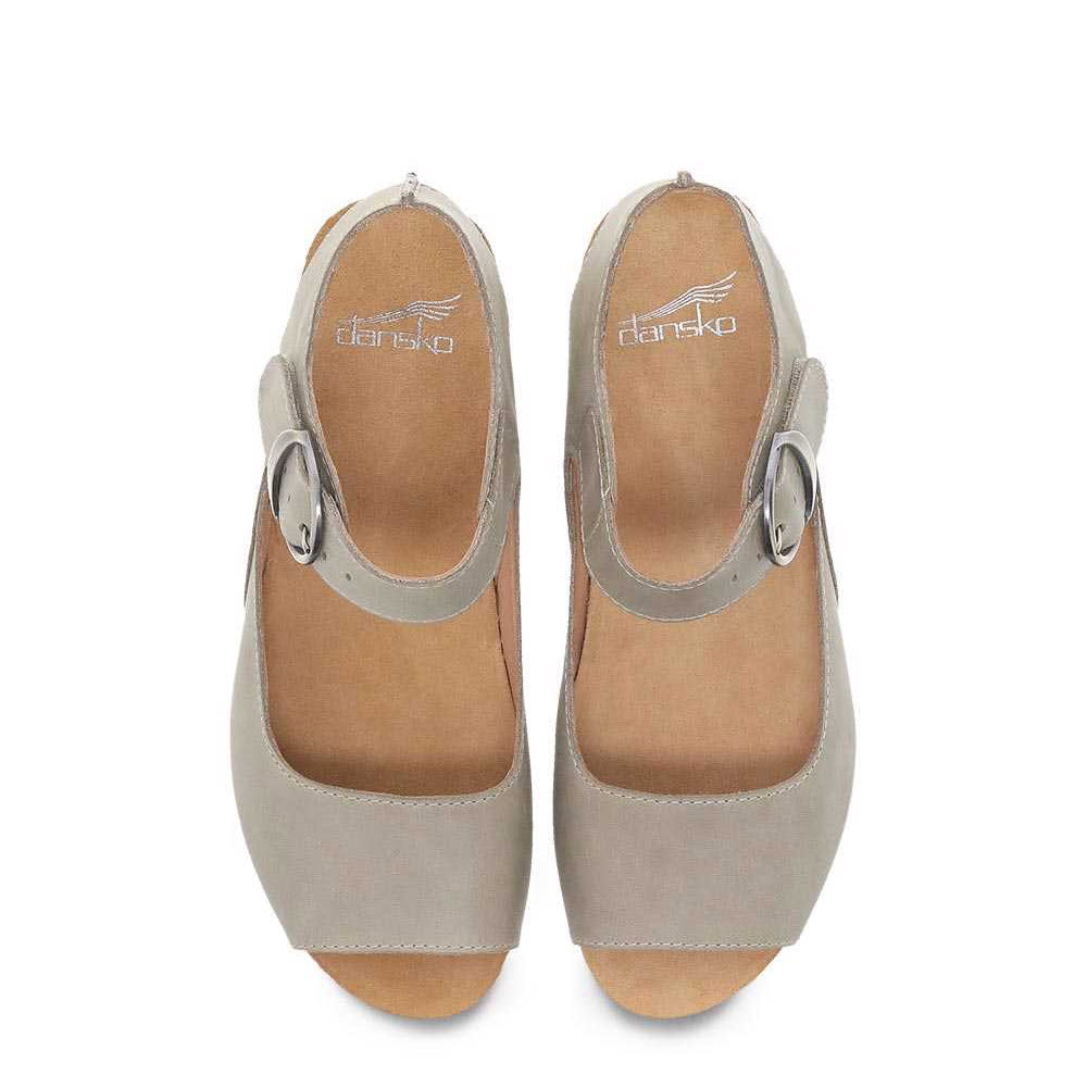 A pair of gray Dansko TIANA KHAKI NUBUCK women&#39;s sandals with an ankle strap, viewed from the top on a white background.