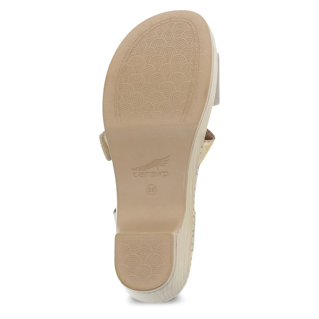 Bottom view of a beige, triple strap Dansko Malena Metallic Multi sandal showing its textured sole with a brand logo.