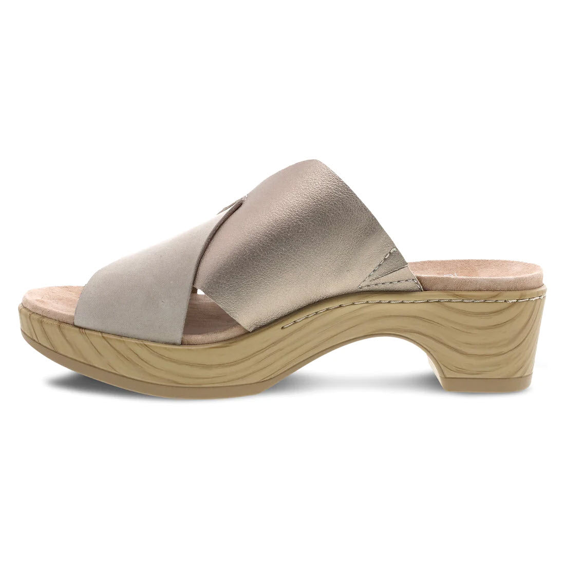 A single beige, open-toe slide sandal with a wide leather top strap and wooden platform sole, viewed from the side against a white background, like the Dansko Miri Sand Multi - Womens.