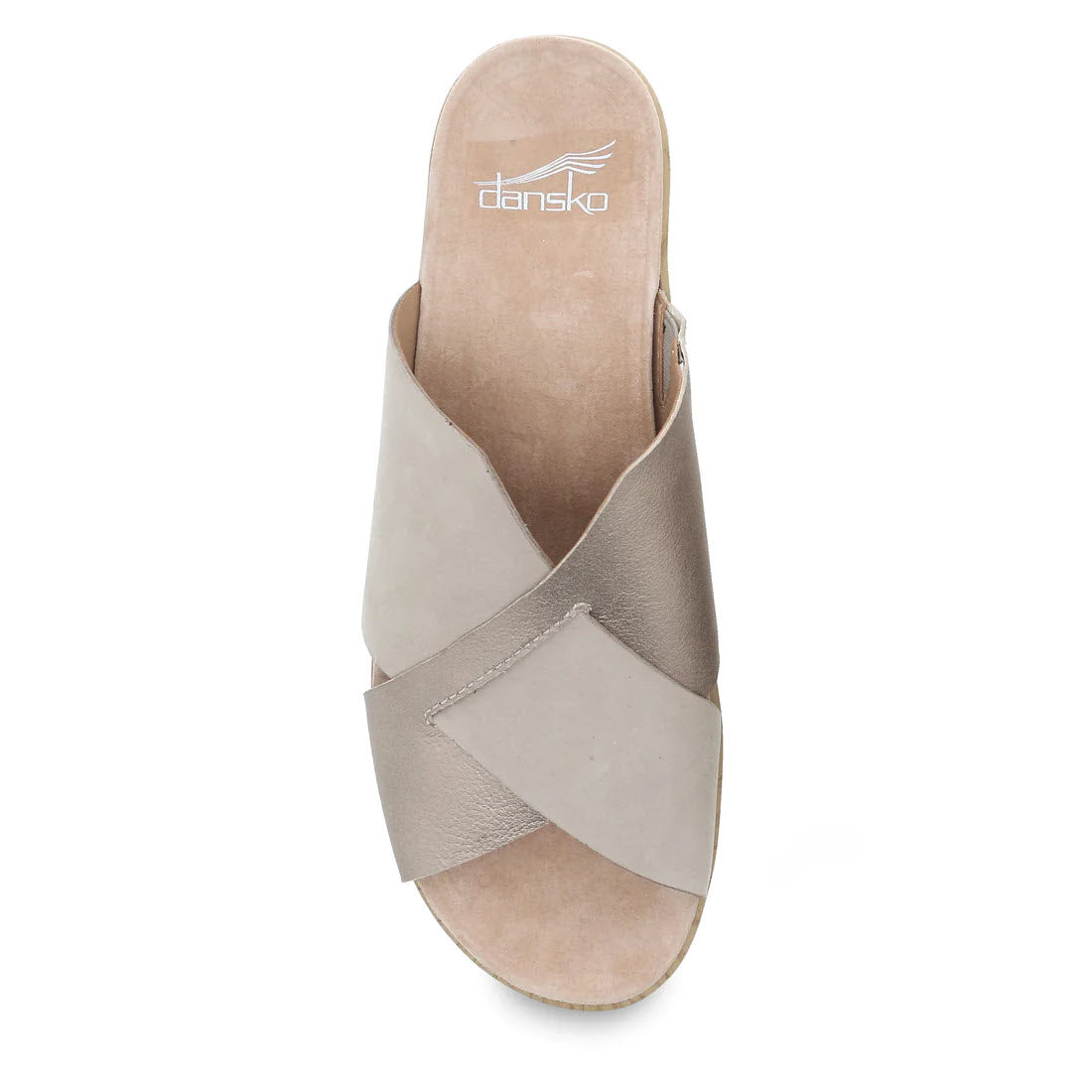 A top view of a Dansko Miri Sand Multi women&#39;s slide sandal with crisscross metallic and nude leather uppers on a white background.