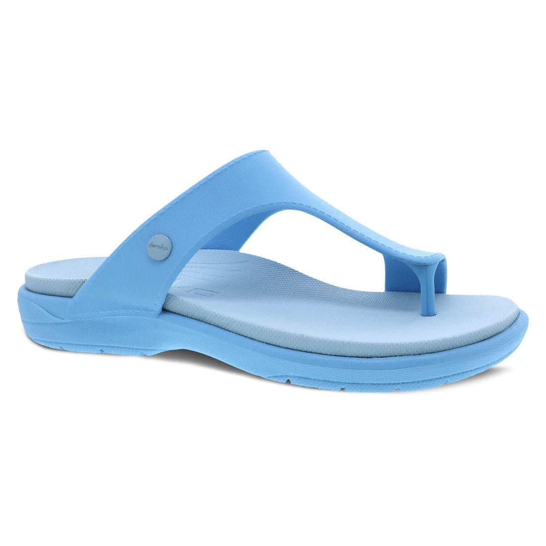 A single light blue, bio-based Dansko Krystal Blue - Womens flip-flop sandal on a white background.