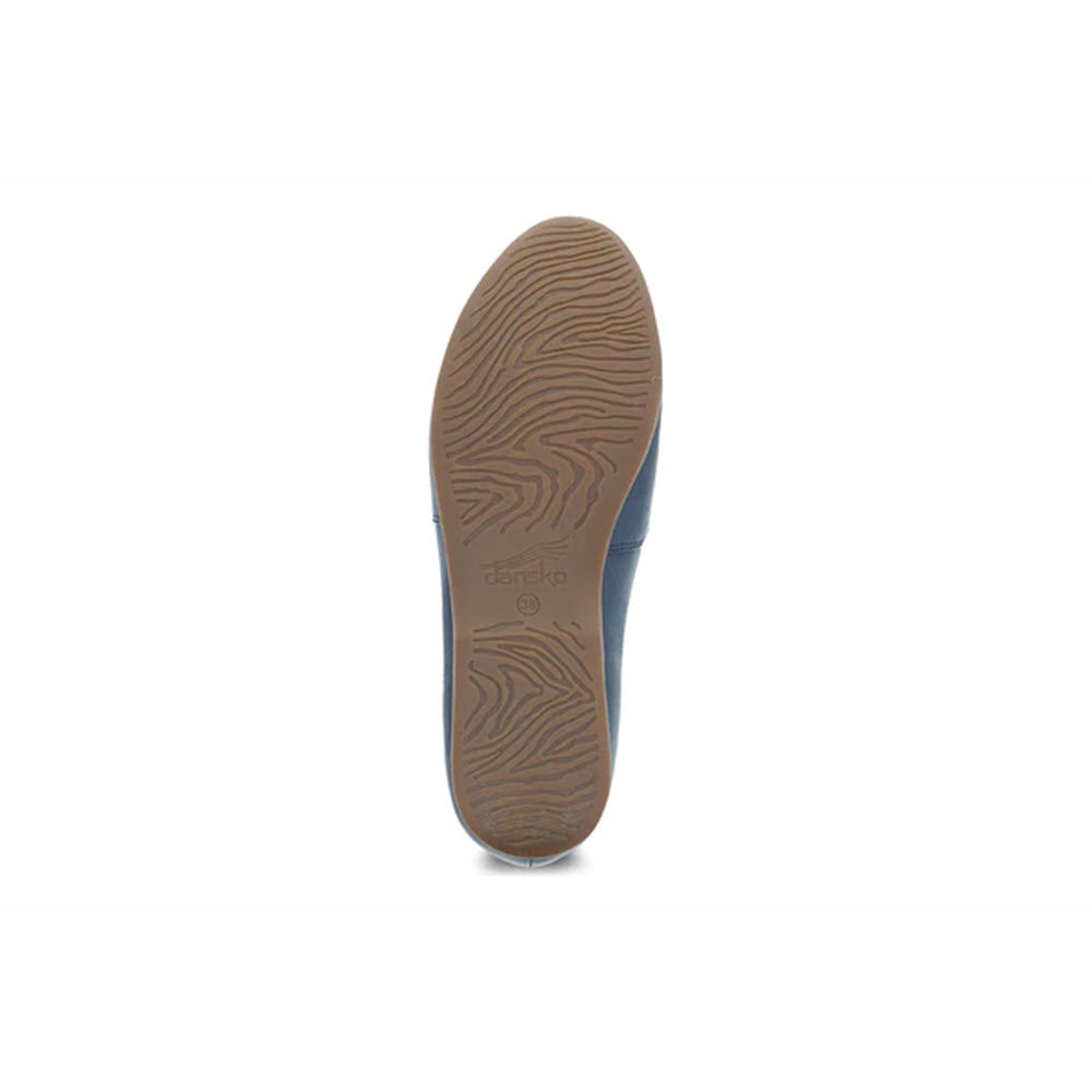 A DANSKO LARISA NAVY - WOMENS rubber sole with arch support technology displaying textured patterns and the brand logo &quot;Dansko&quot;.