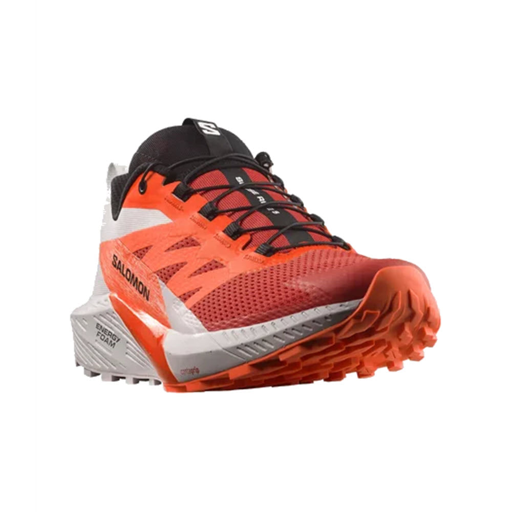 Red and grey Salomon Sense Ride 5 Lunar Rock trail running shoe with black accents, displayed against a white background.