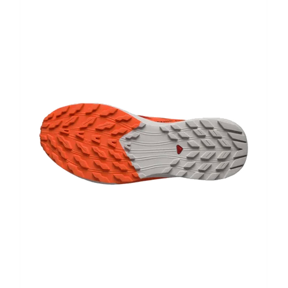 Sole of a Salomon trail shoe with a dual-tone tread pattern, featuring bright orange and light grey areas and a small red heart detail.