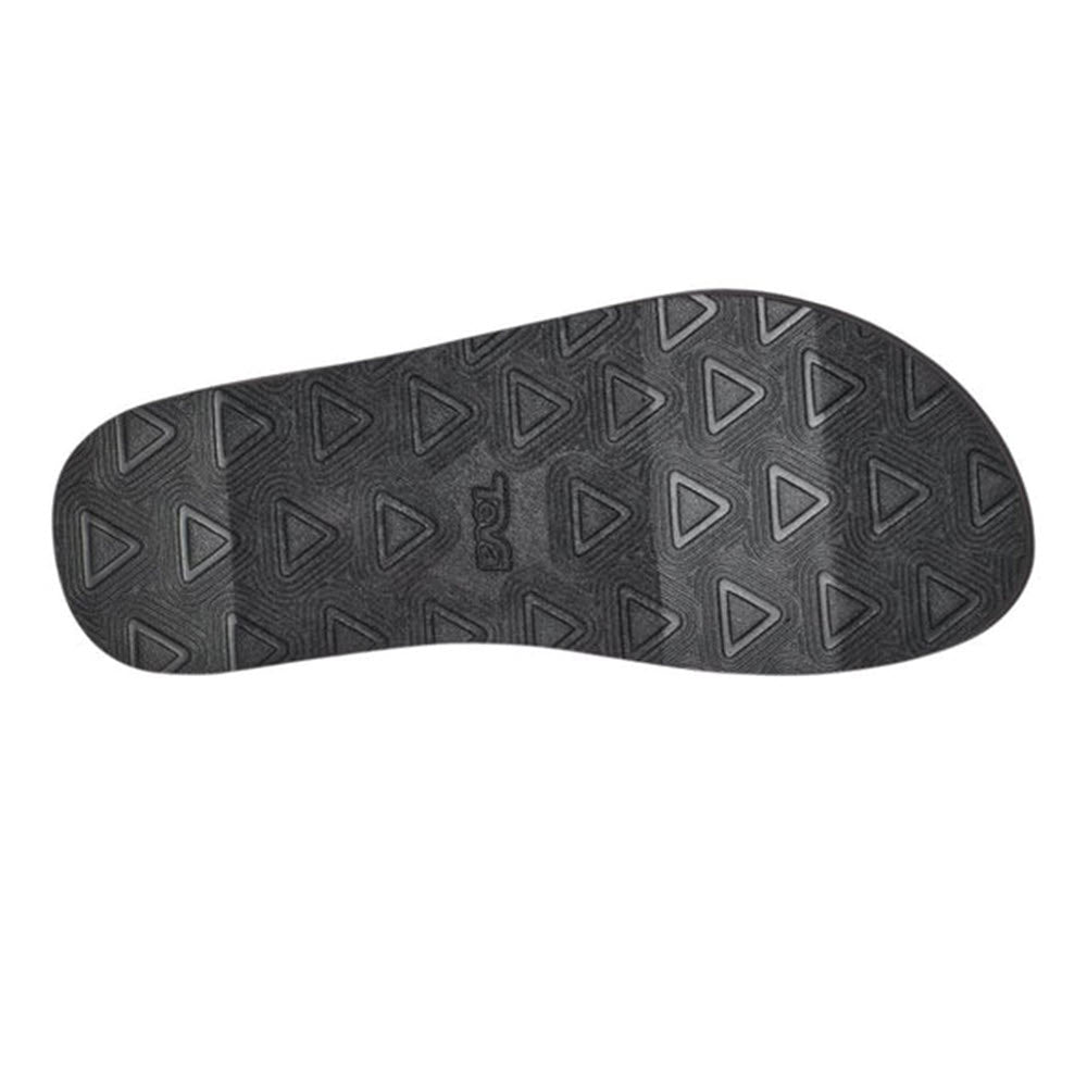 Black Teva shoe sole with triangular tread pattern and recycled content.