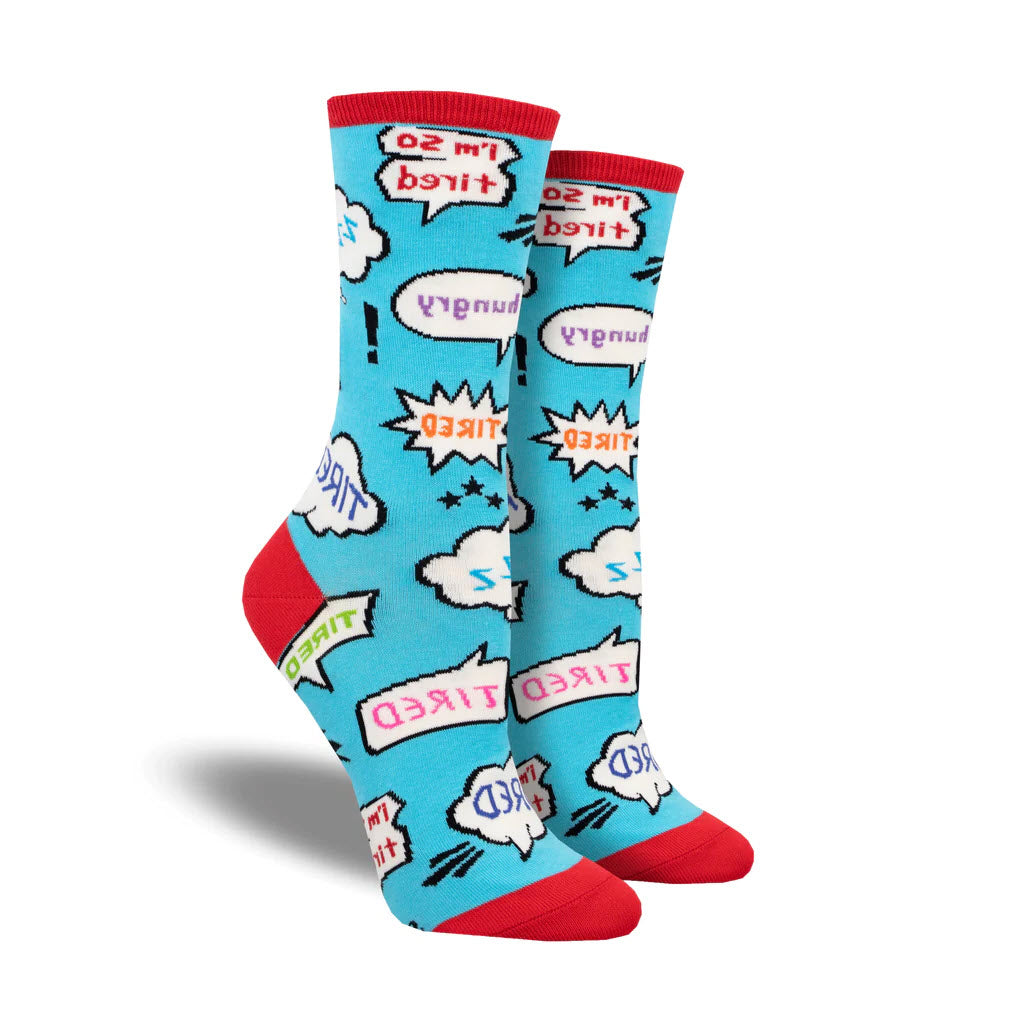 A pair of SOCKSMITH NO REST CREW SOCKS BLUE featuring red toes and heels, and decorated with various white and red comic book-style exclamations such as "bang!" and "wow!" to express the mood of tired people.