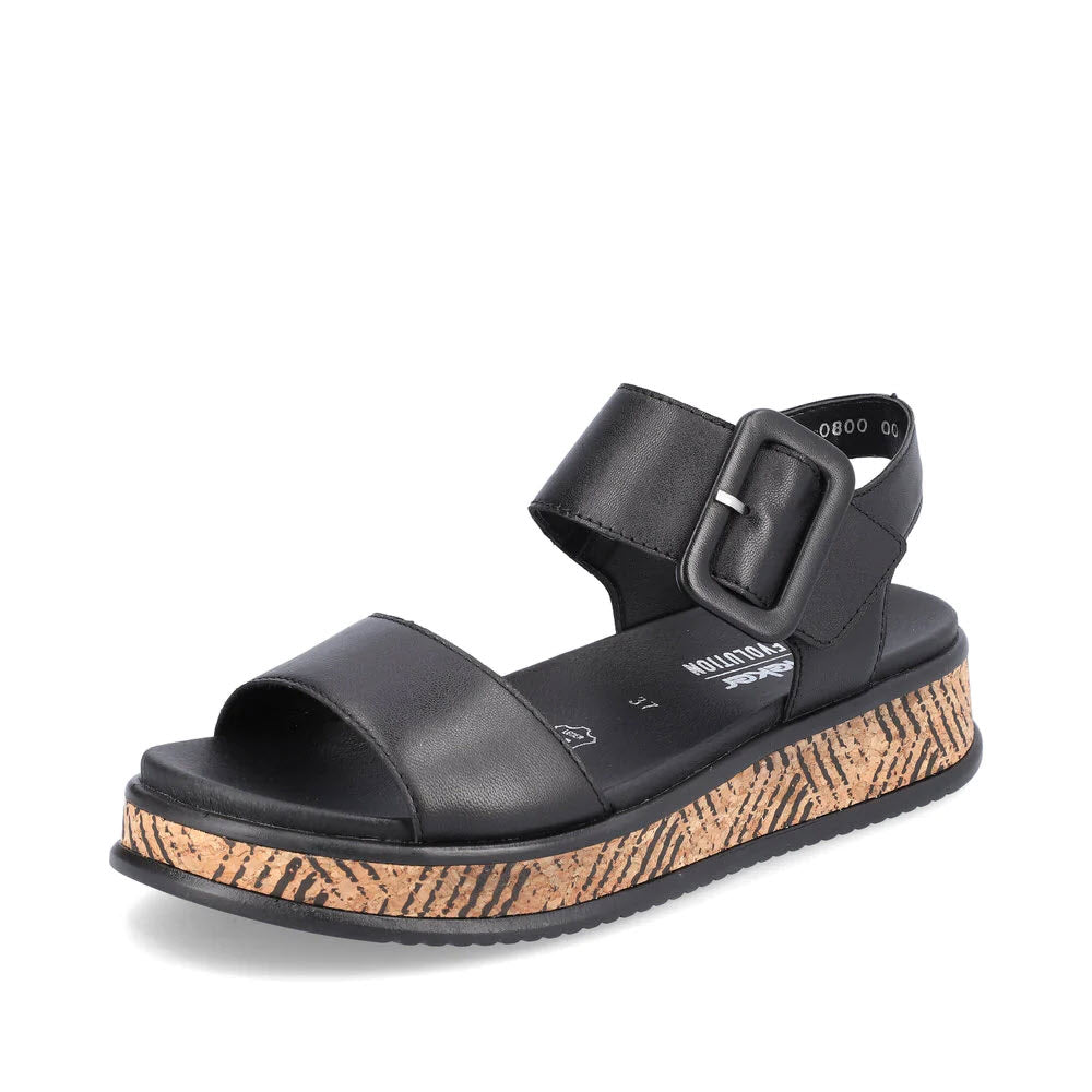 REVOLUTION MIDFORM BIG BUCKLE SANDAL BLACK - WOMENS sandal with a cork-style sole displayed on a white background.