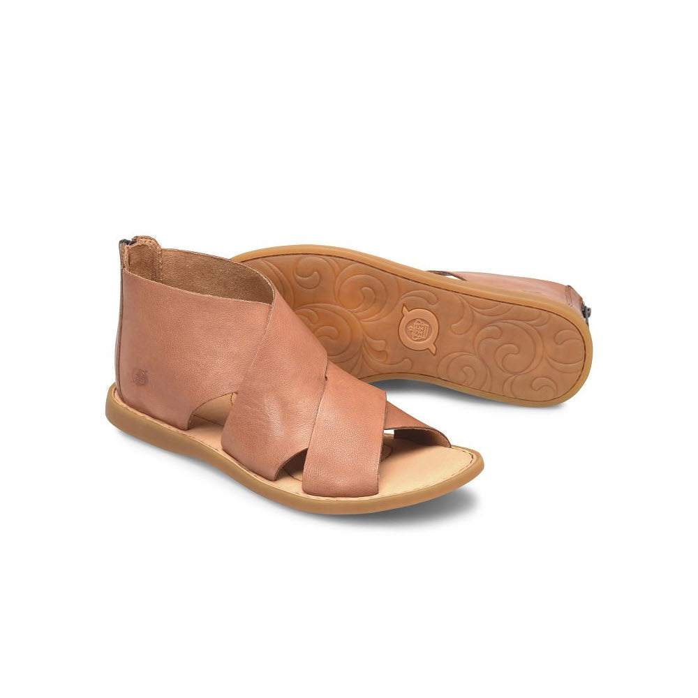 A pair of light brown ultra-soft leather sandals with crisscross straps and a zipper on the back, displayed alongside its sole pattern. The product is the Born Imani Sandals - Women&#39;s.