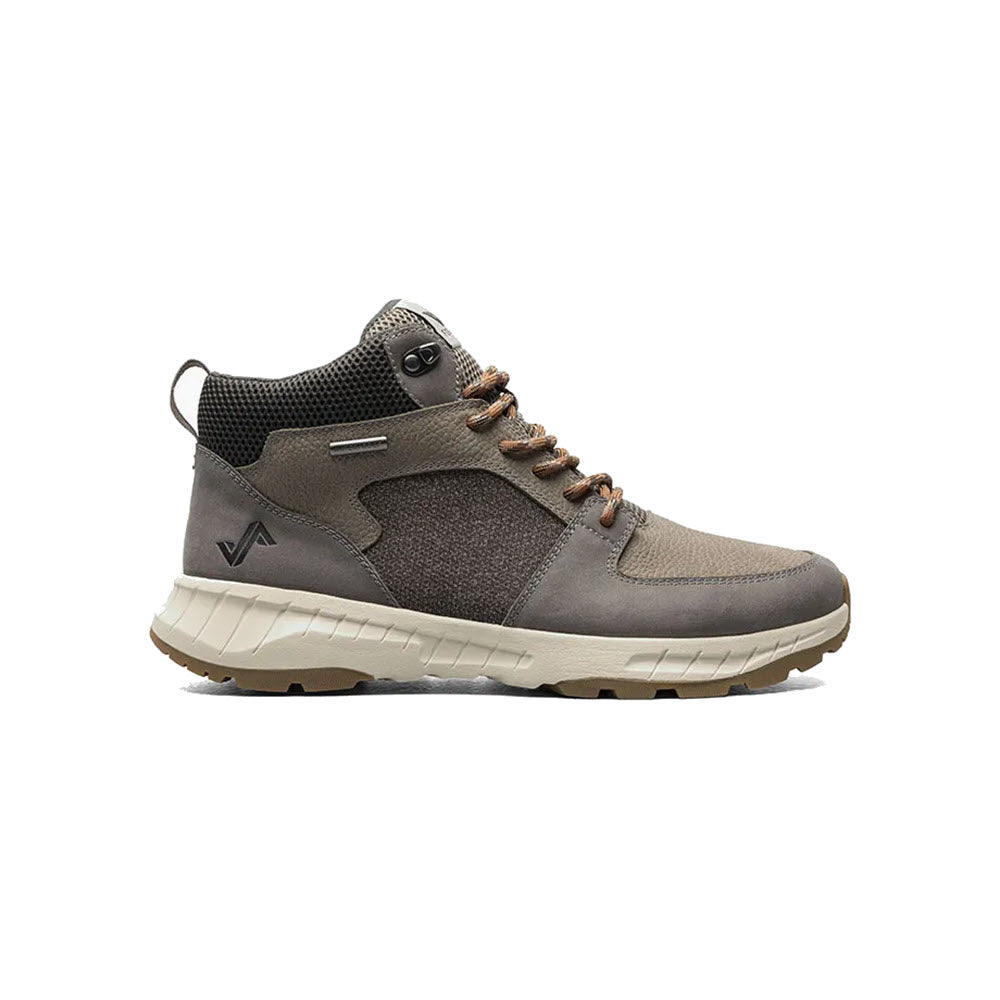 A Forsake Wild Sky Mid Dark Gray/Gold hiking boot with brown laces on a white background, featuring a prominent logo on the side and an aggressive traction sole.