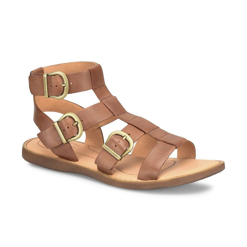 A pair of Born Haidee Brown - Womens leather gladiator sandals with buckle closures.