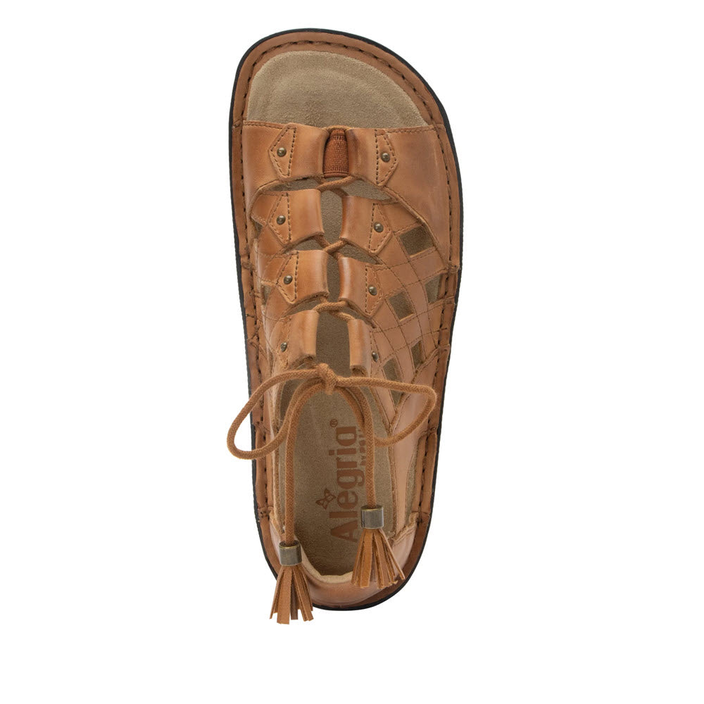 Top-down view of a Alegria Valerie Cognac - Womens moccasin with decorative stitching and ghillie lacing details on the shoelace.