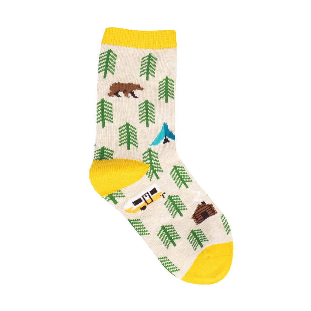 A single beige cotton sock with a yellow toe and heel, patterned with green trees, brown bears, and blue tents by Socksmith.