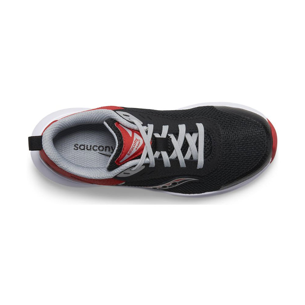 Top view of a black and red kids&#39; Saucony Axon 3 running shoe with white laces and logo visible, featuring a leather and mesh upper.
