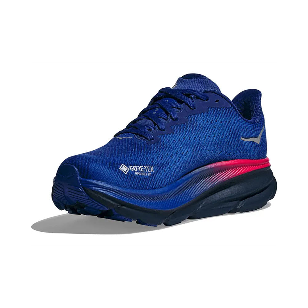 Blue HOKA Clifton 9 GTX running shoe with a pink and black sole, featuring a reflective logo on the side.