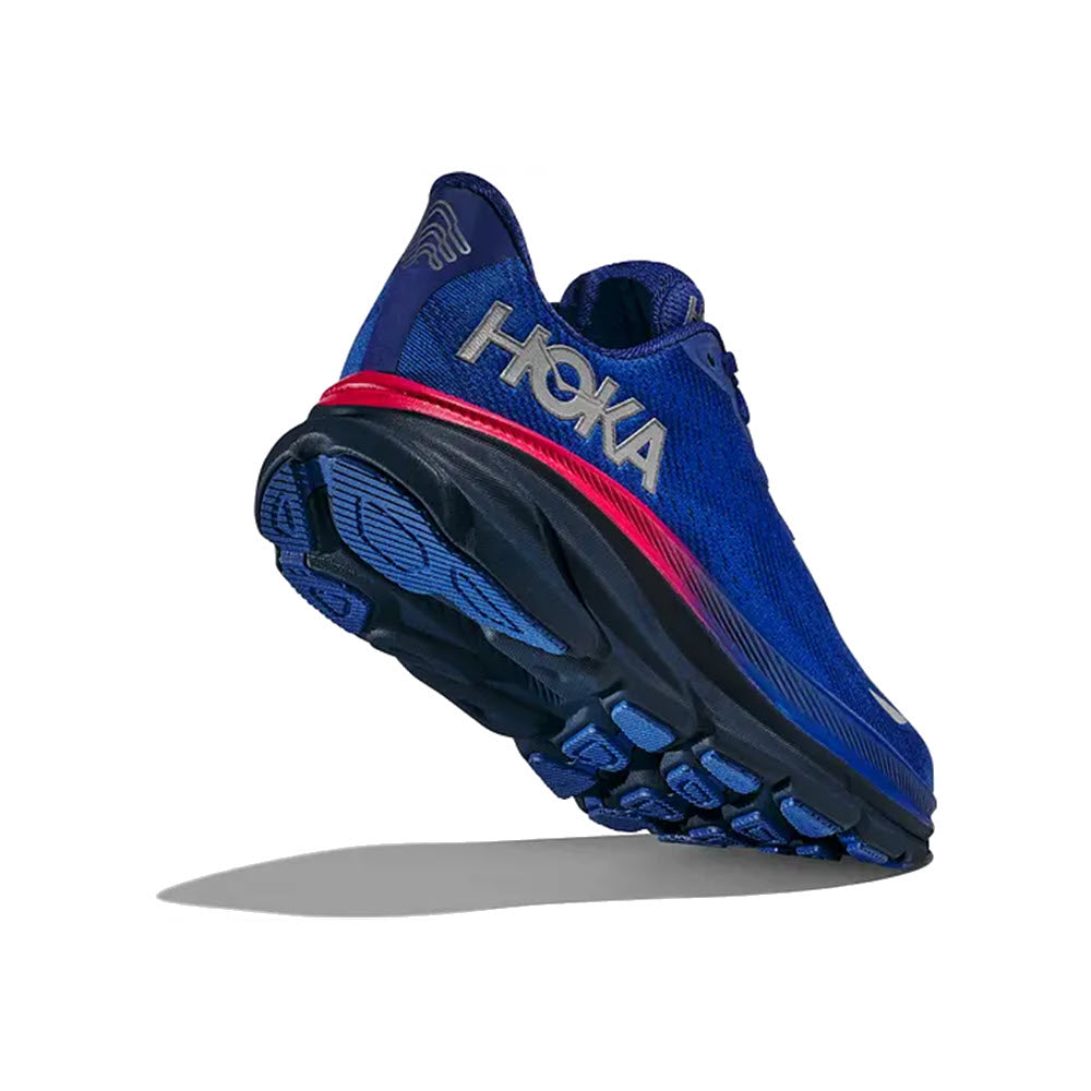 A single blue and black Hoka Clifton 9 GTX running shoe with a red accent floating above a white background.