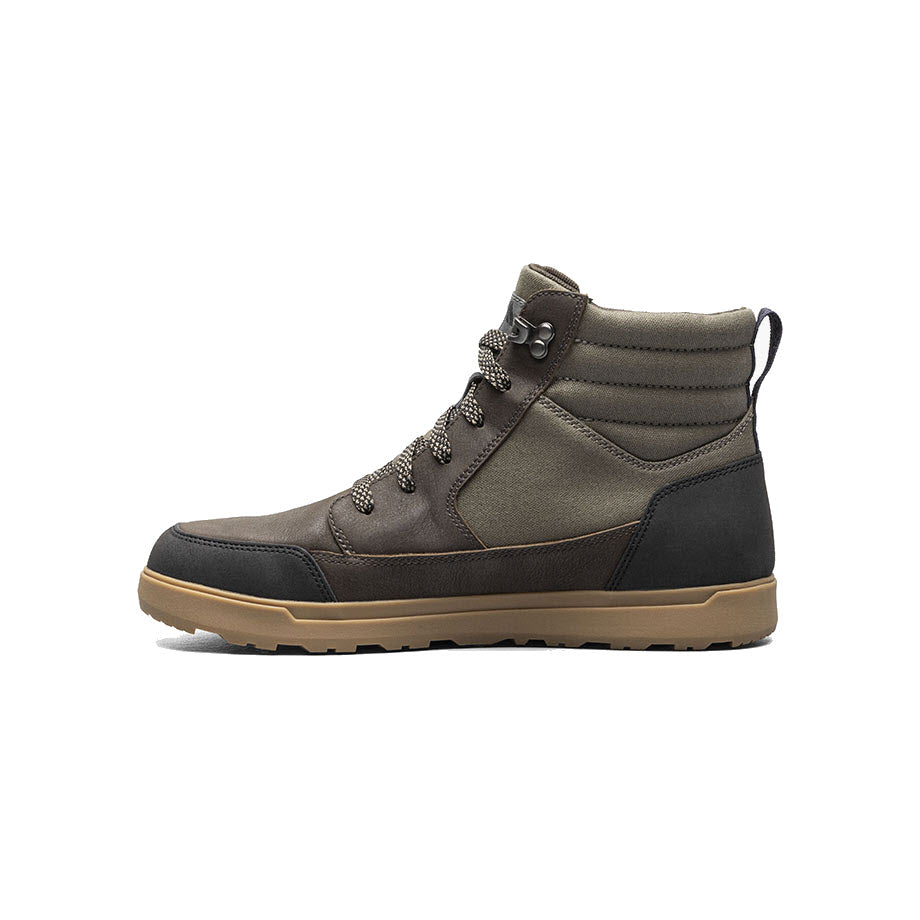 A single brown waterproof high-top boot with laces, featuring a sturdy sole and pull loop on the back, isolated on a white background.