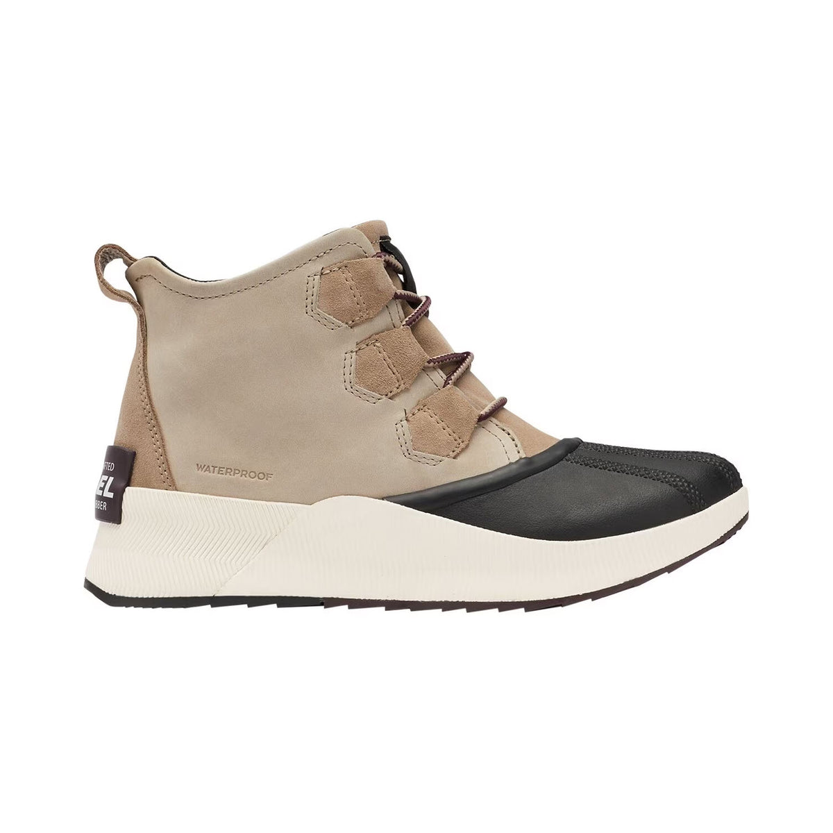 Beige and black waterproof boot with hook and loop strap closure, enhanced traction, and a chunky white sole, isolated on a white background. 
Product Name: SOREL OUT N ABOUT III CLASSIC OMEGA TAUPE - WOMENS 
Brand Name: Sorel