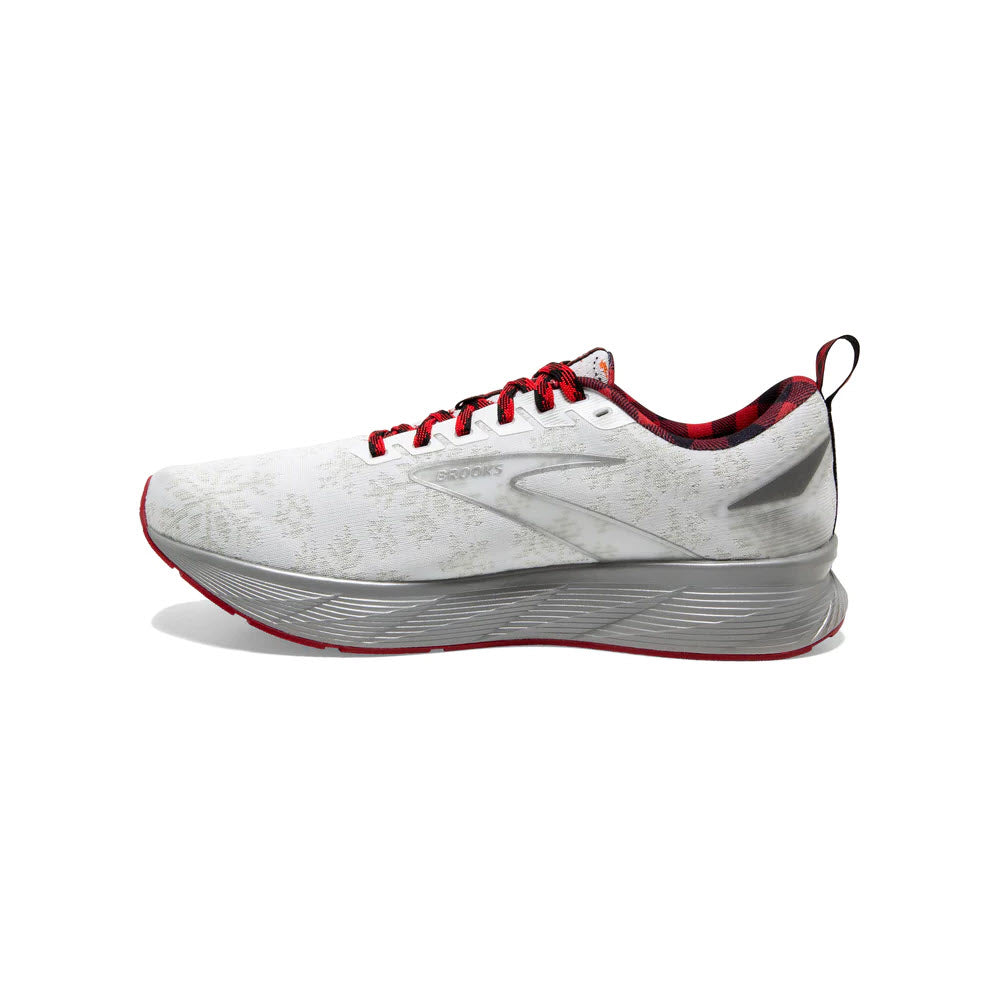 A single Brooks BROOKS LEVITATE 6 CHRISTMAS WHITE/RED/SILVER - WOMENS running shoe with an engineered creel mesh upper in white and gray, red laces, and a thick gray sole, displayed on a white background.