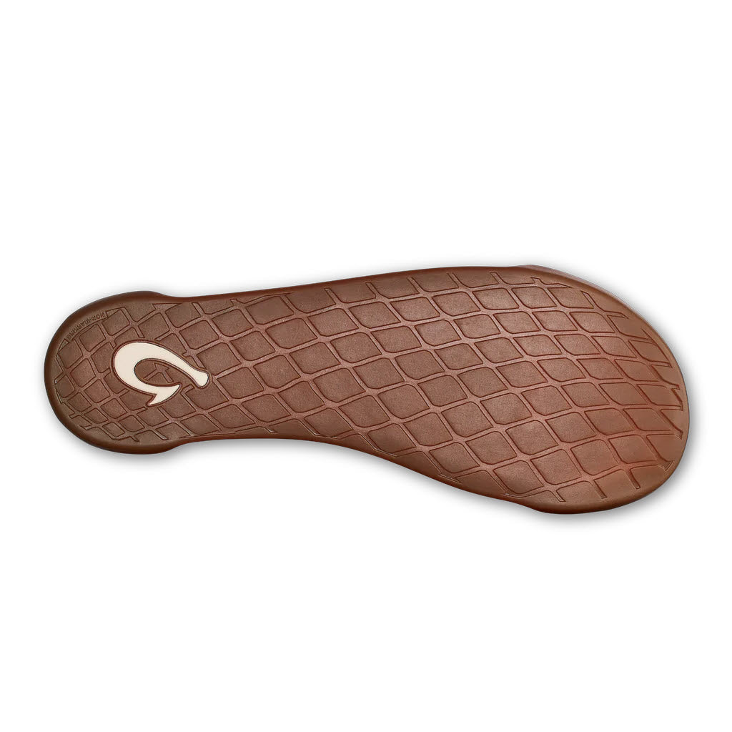 Brown premium nubuck leather OluKai Kipuka Hulu Slipper Natural/Natural - Mens sole with a diamond pattern and a circular Olukai logo visible, isolated on a white background.